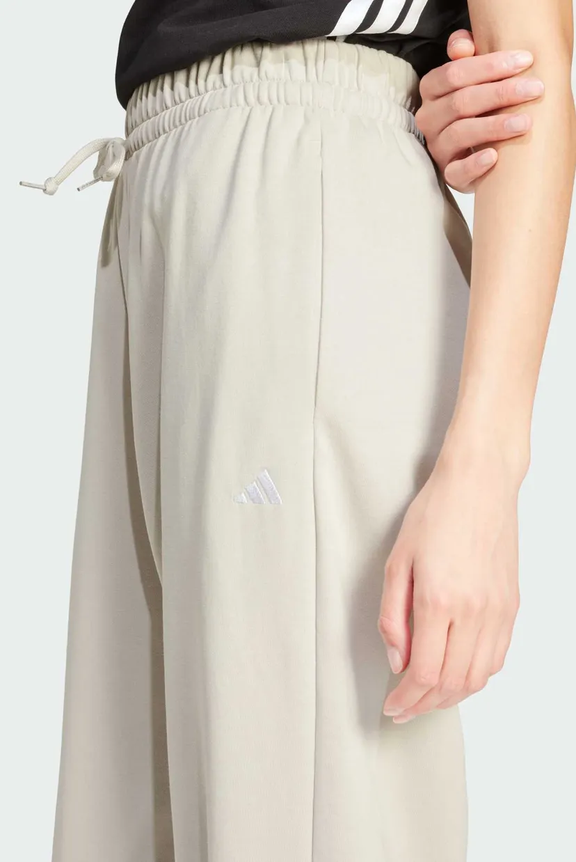 Женские бежевые спортивные брюки Essentials Small Logo French Terry Cuffed 4