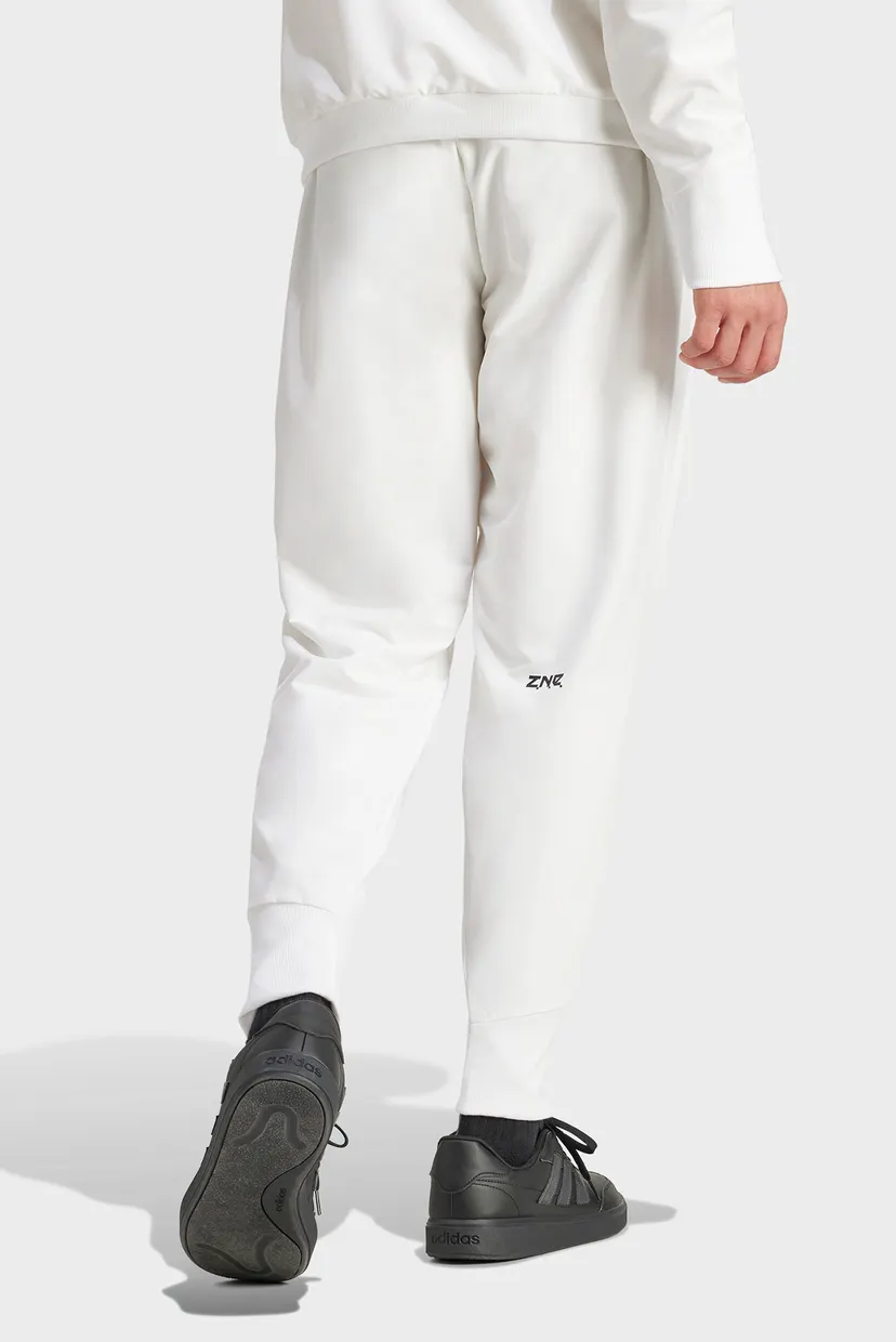 Мужские белые спортивные брюки Z.N.E. Woven adidas IN1909 — MD-Fashion