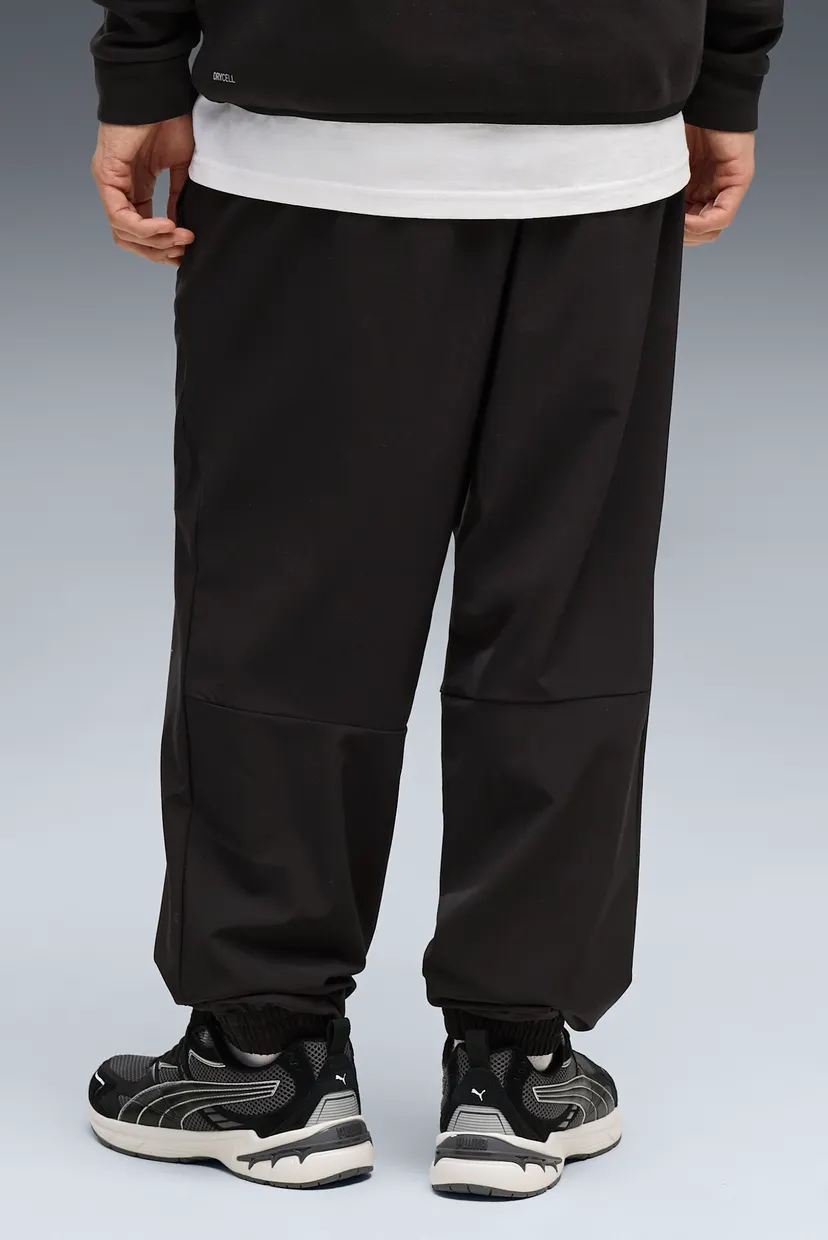 Мужские черные спортивные брюки PUMATECH 4-Way Stretch Woven Pants Men 3