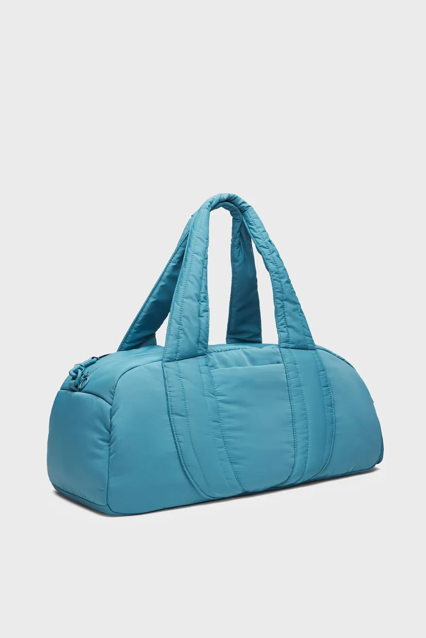 Жіноча блакитна спортивна сумка UA Studio Soft Duffle 3