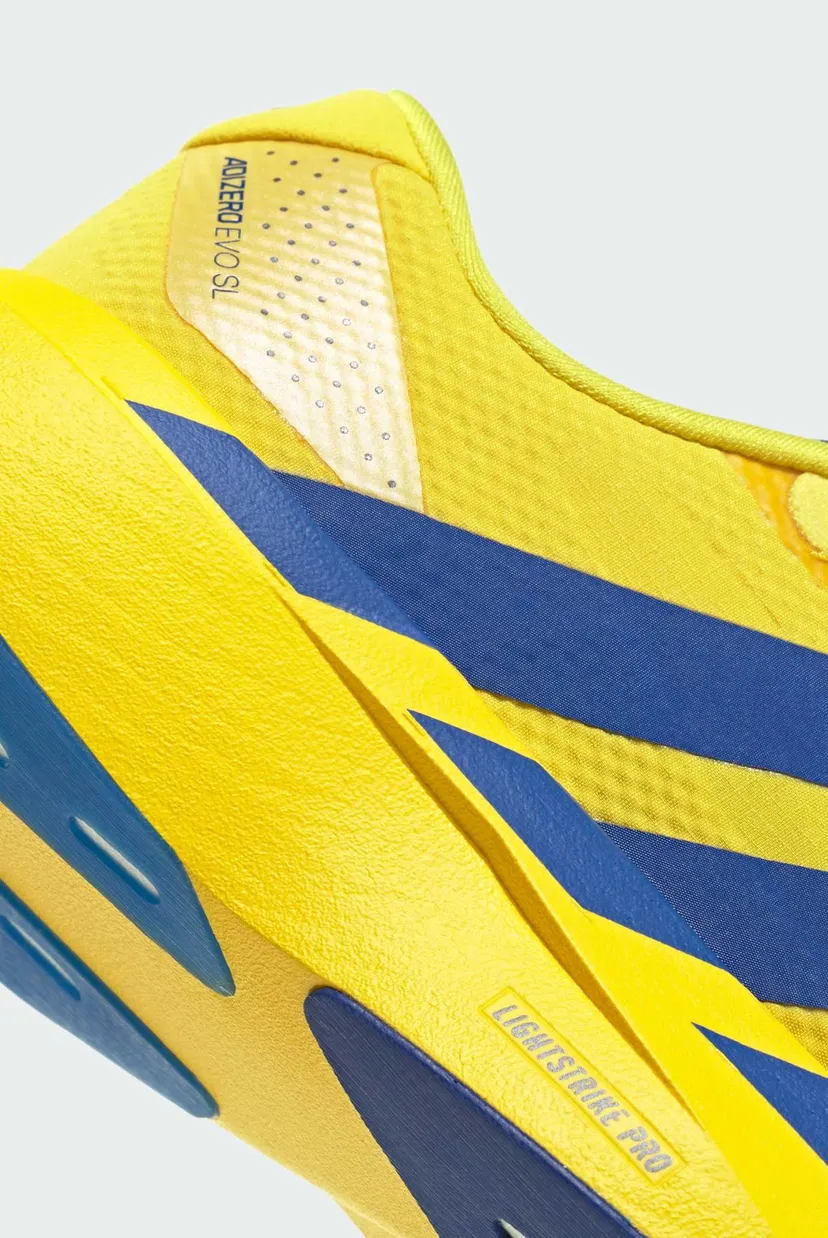 Женские желтые кроссовки Adizero EVO SL 8
