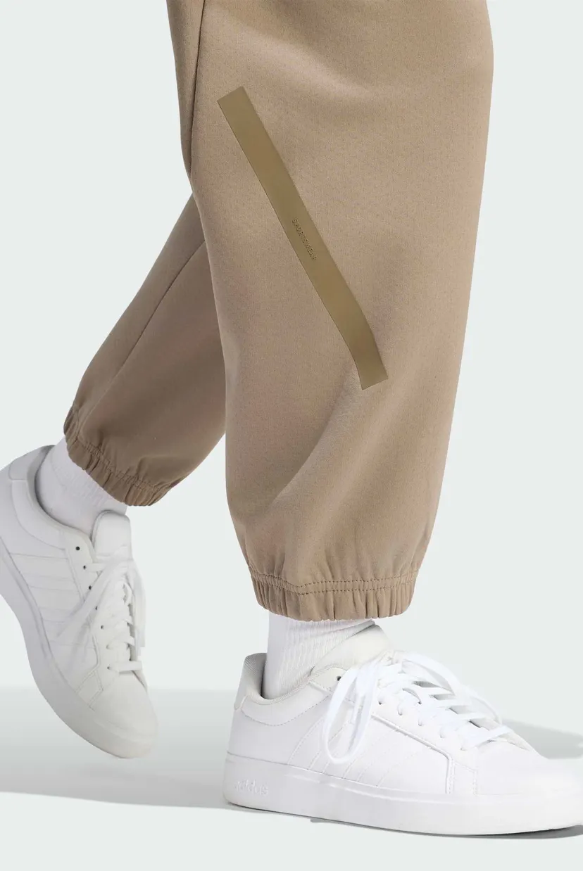 Жіночі бежеві спортивні штани ADIDAS Z.N.E. 5