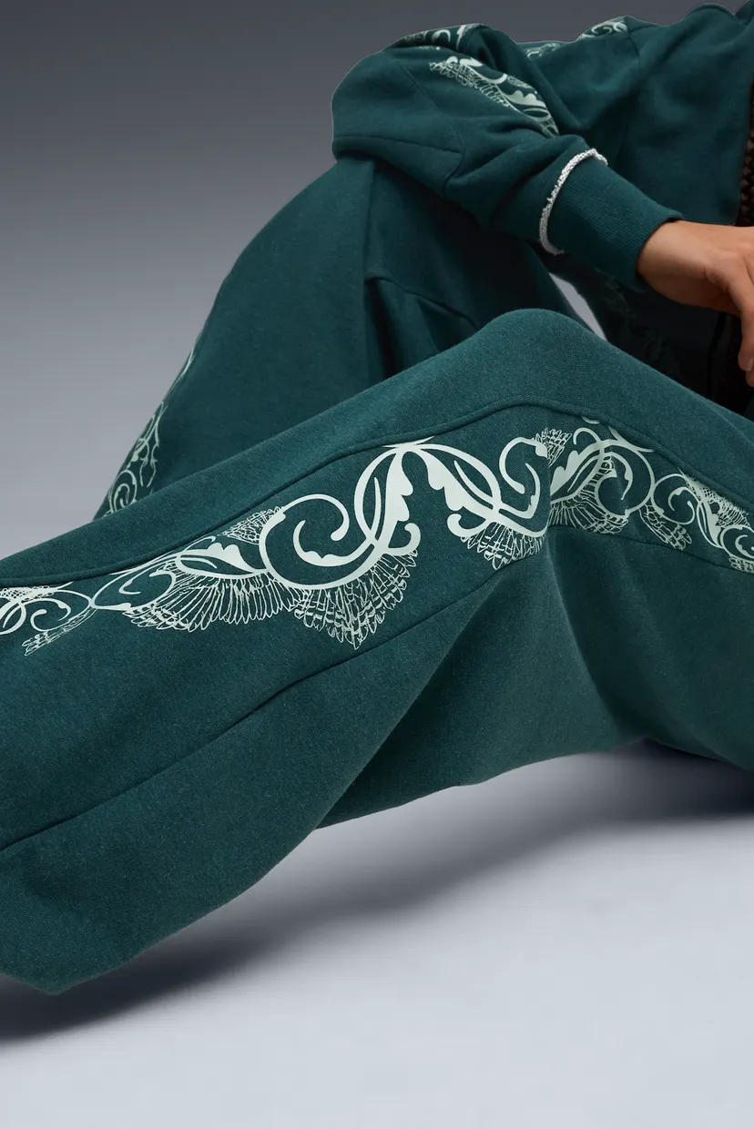 Женские зеленые спортивные брюки PUMA HOOPS x HARRY POTTER™ Sweatpants Women 5