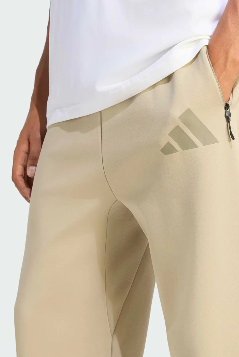 Чоловічі бежеві спортивні штани adidas Z.N.E. Open-Hem 4