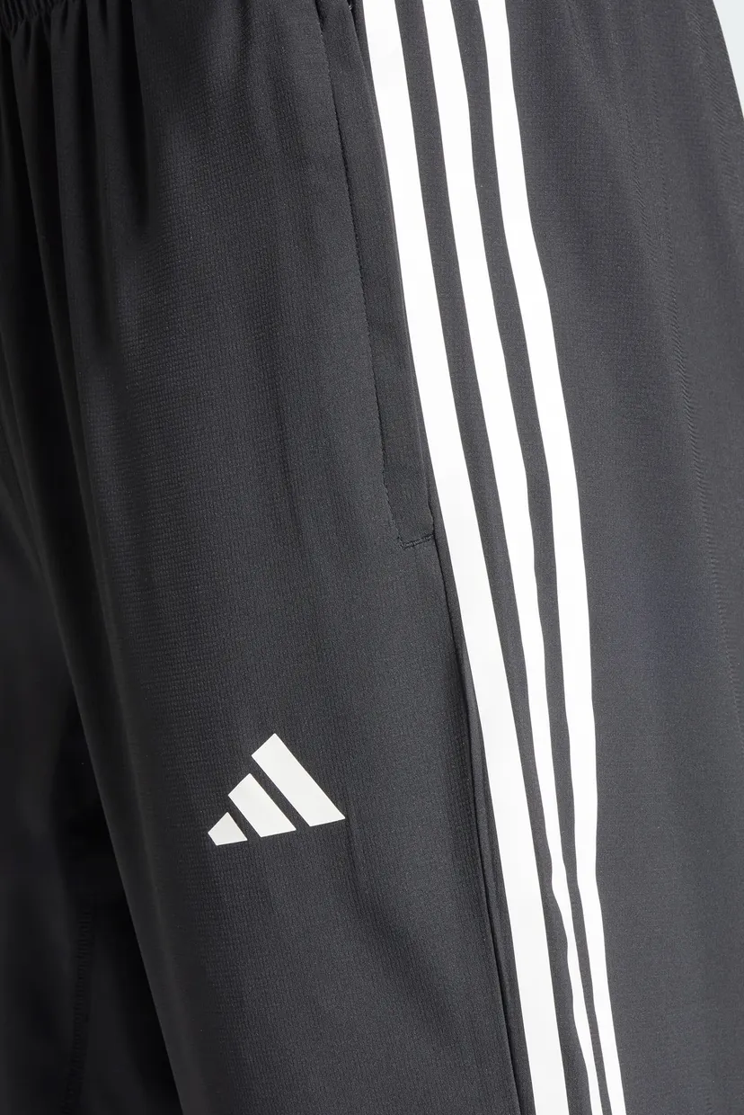 Чоловічі чорні спортивні штани Own the Run 3-Stripes 4