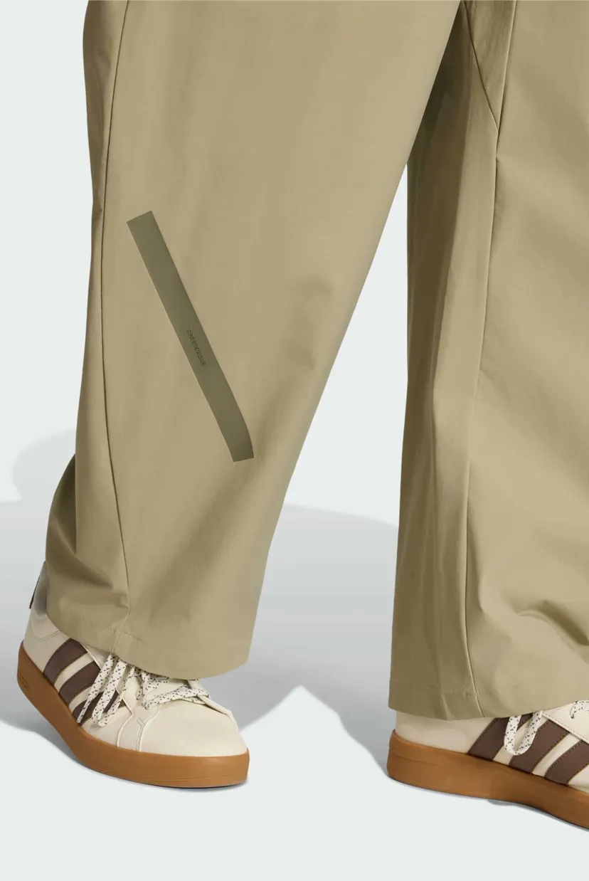 Чоловічі бежеві спортивні штани ADIDAS Z.N.E. WOVEN 5