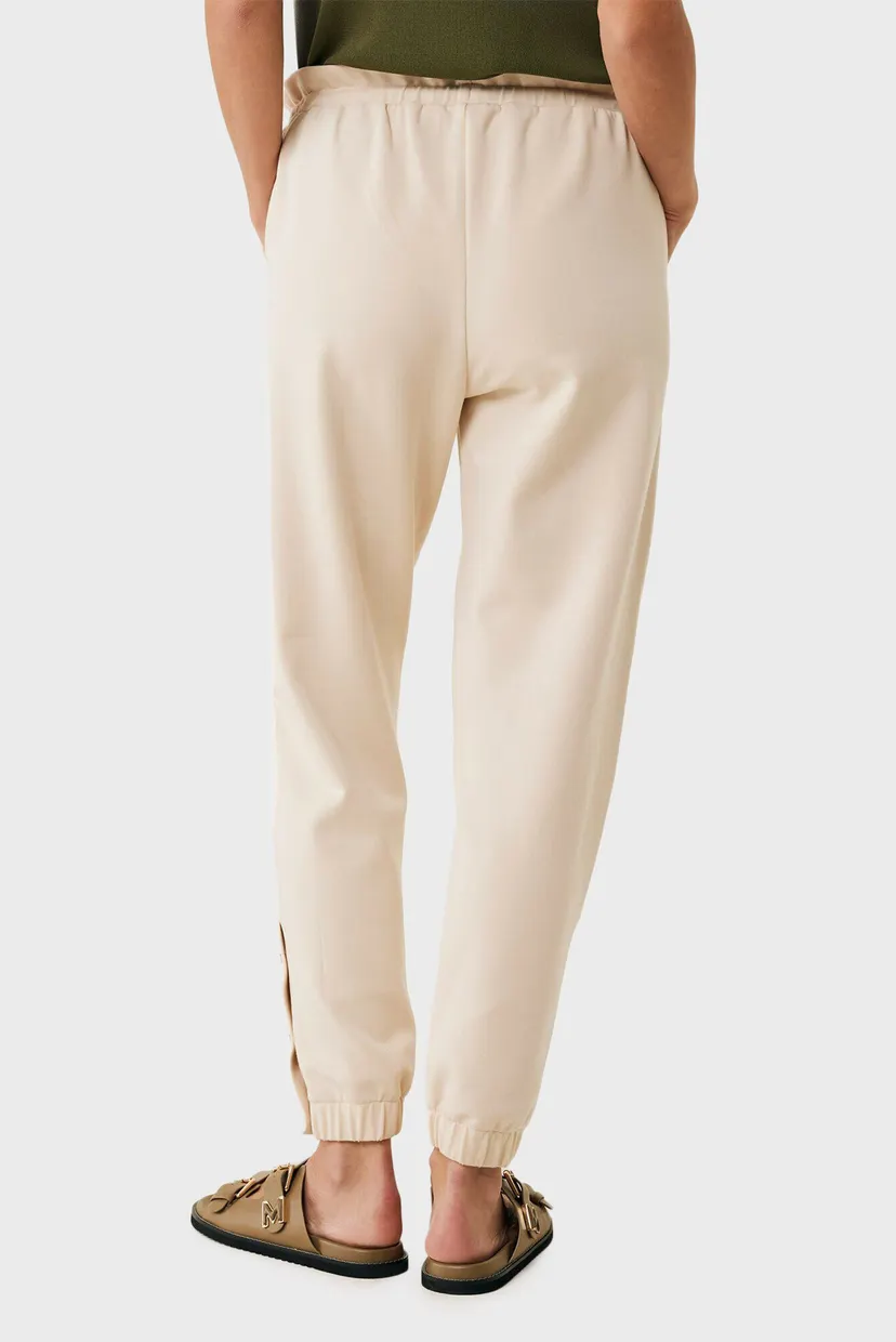 Женские бежевые спортивные брюки Travel pants 3