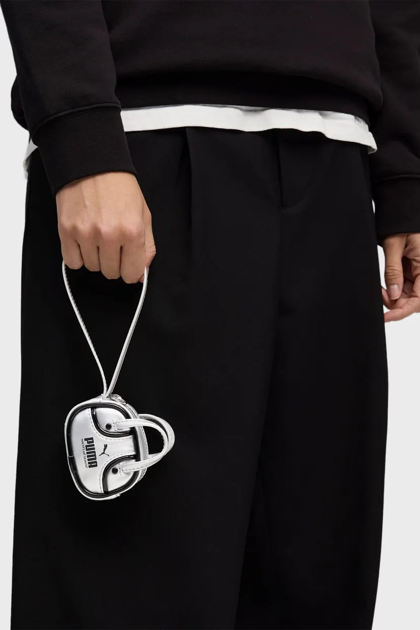 むむ Женская серебристая сумка PUMA 1976 METALLIC 0.2L Grip Bag