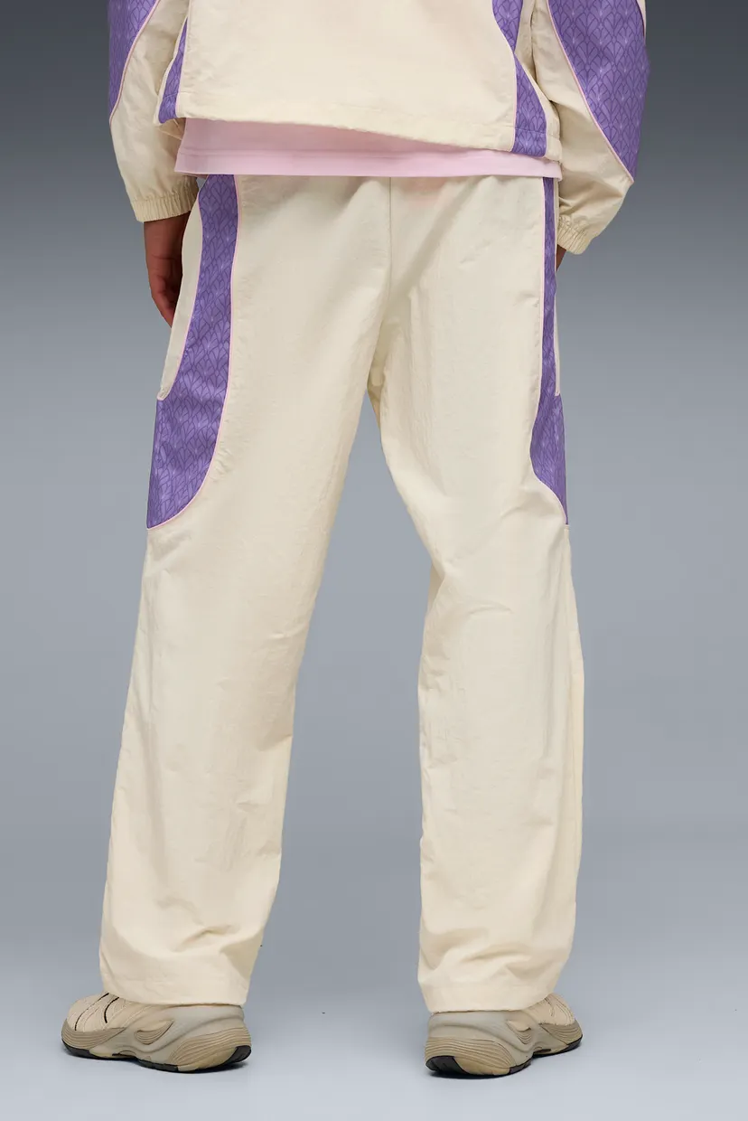 Чоловічі бежеві спортивні штани PUMA x POKÉMON PUMATECH-X Relaxed Track Pants Men 3