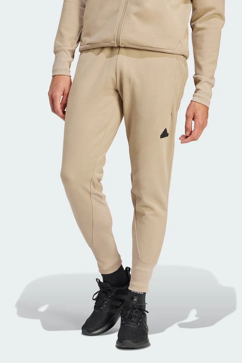 Мужские бежевые спортивные брюки Z.N.E. Winterized adidas IS9281