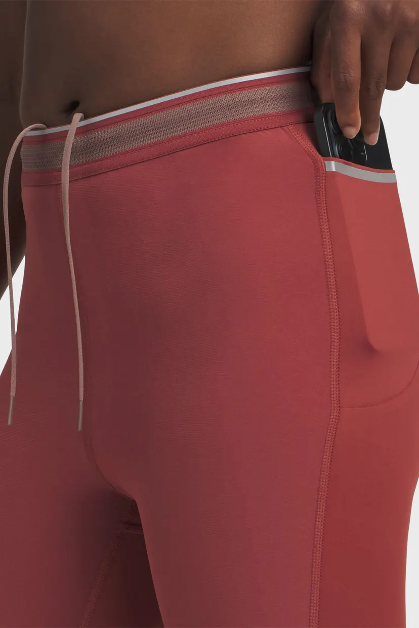 Женские терракотовые тайтсы UA Halo Run CW Tights 4