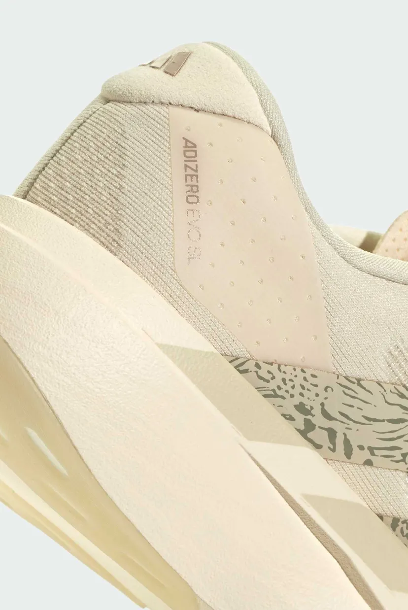 Жіночі бежеві кросівки Adizero EVO SL 9