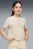 Дитяча бежева футболка PUMA Class Graphic Tee Youth