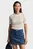 Жіночий білий джемпер у смужку CABLE