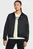 Женская черная ветровка UA SPORT WINDBREAKER JKT