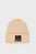 Женская бежевая шапка knitted logo