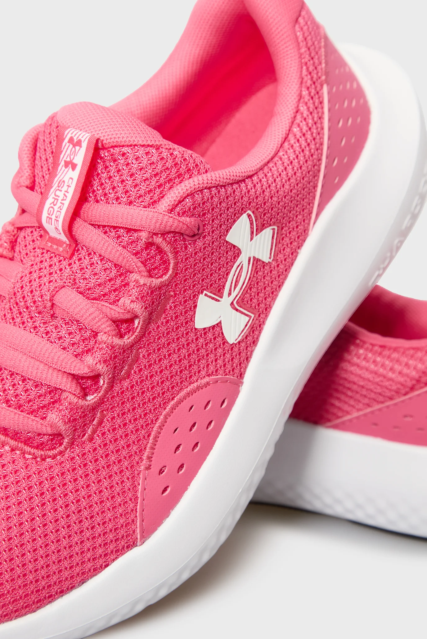 Жіночі рожеві кросівки UA Charged Surge 4 Under Armour 3027007-672