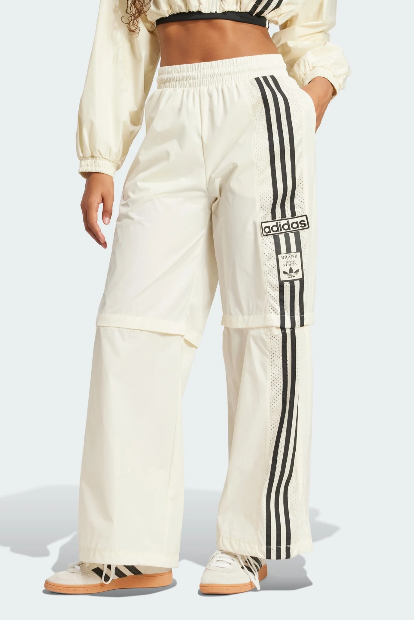Жіночі білі спортивні штани 2в1 Adibreak Woven Track adidas JD0087 Жіночі білі спортивні штани 2в1 Adibreak Woven Track adidas JD0087