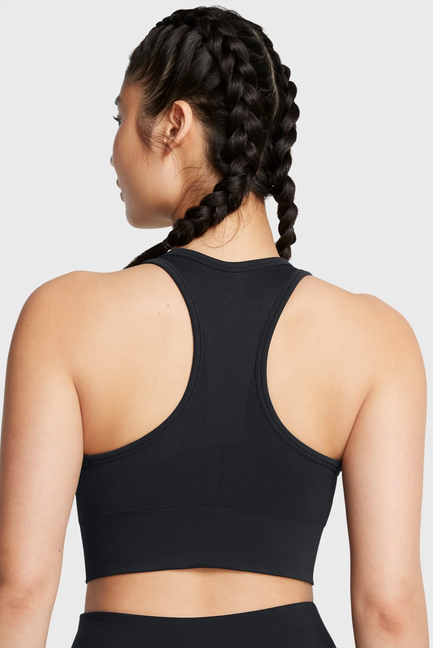 Женский черный топ Vanish Seamless Mid Bra Under Armour 1384419