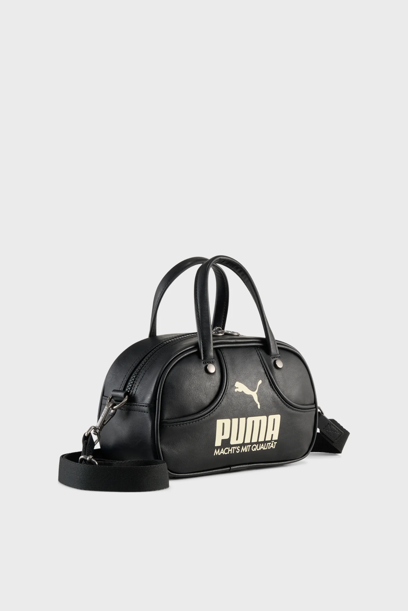 Женская черная сумка PUMA 1976 Archive 2.5L Mini Grip Bag PUMA