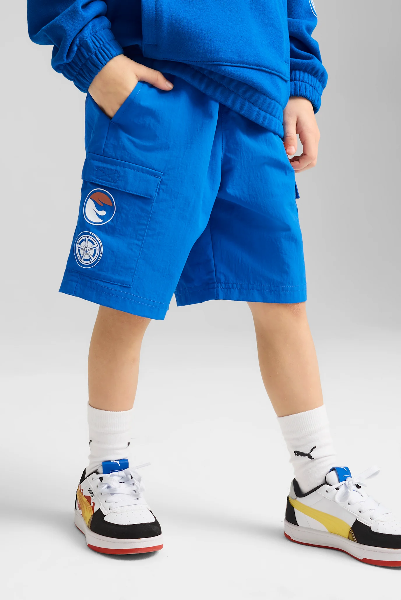 あ様 HAPPY99 H.P.F.C. 3/4 SWEATSHORTS Детские синие шорты PUMA x HOT WHEELS™ Shorts Kids PUMA 630076