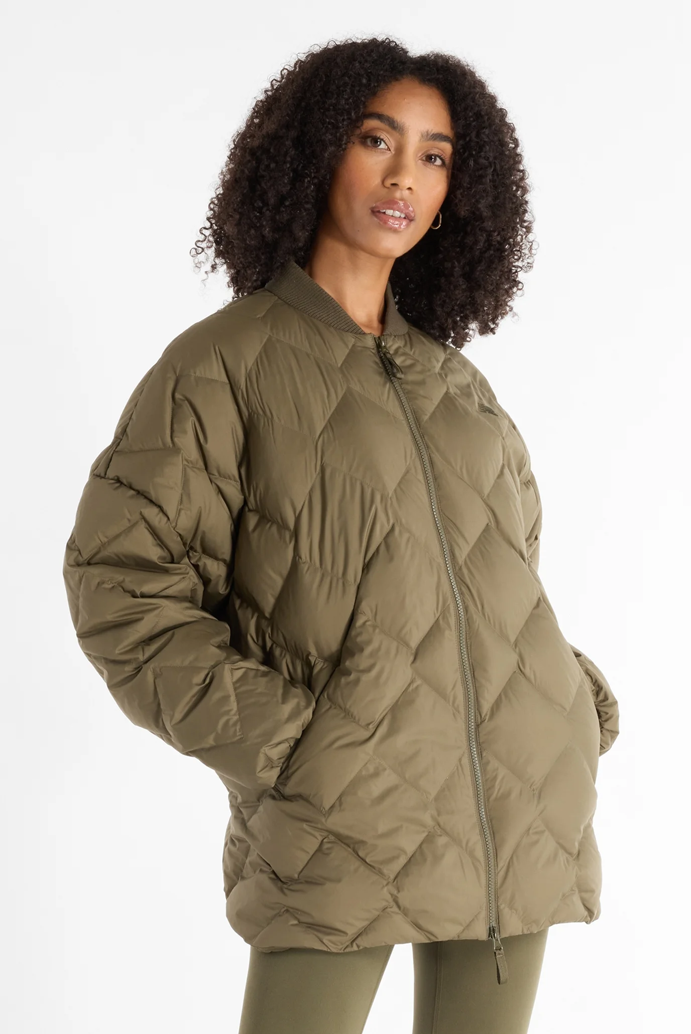 Женская зеленая куртка Pinnacle Bomber New Balance WJ43503DMO — MD