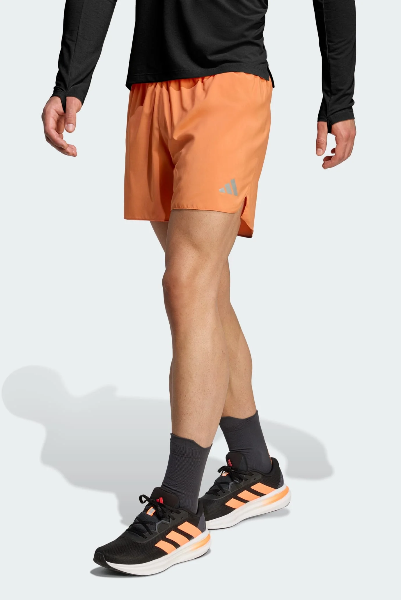 Мужские оранжевые шорты adi365 Running Essentials adidas JZ7771