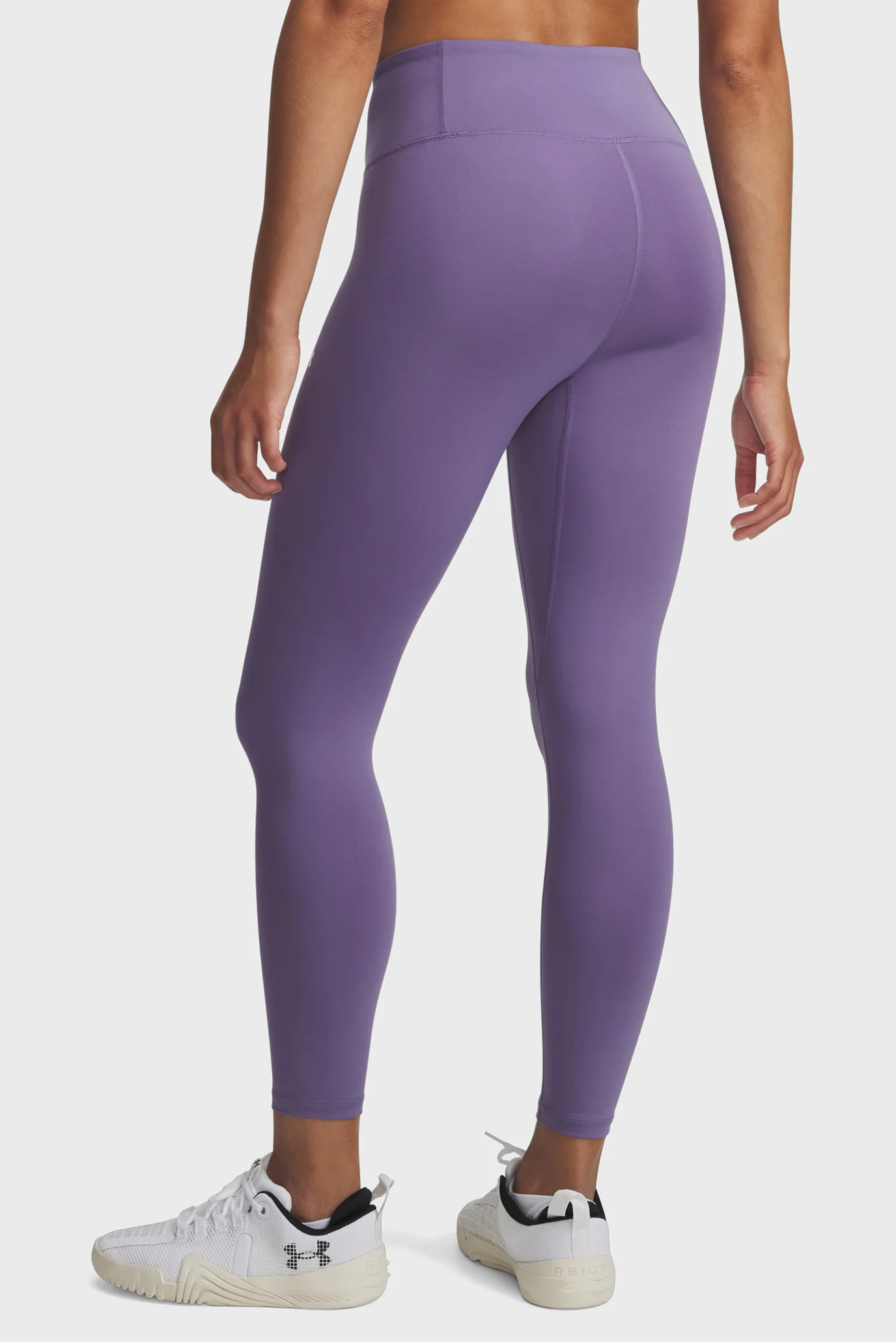 Женские фиолетовые тайтсы Motion Ankle Leg EMEA-PPL Under Armour