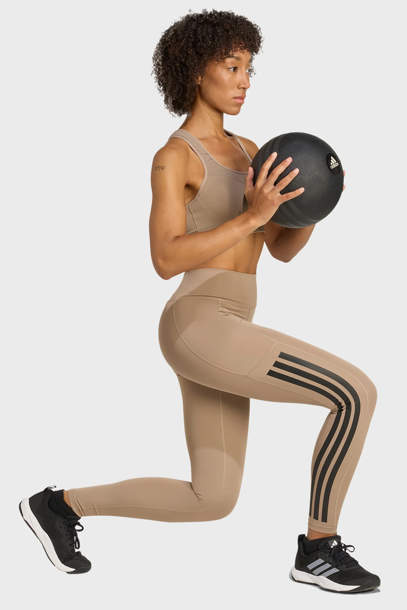 Жіночий бежевий топ TLRD Impact Training High Support adidas