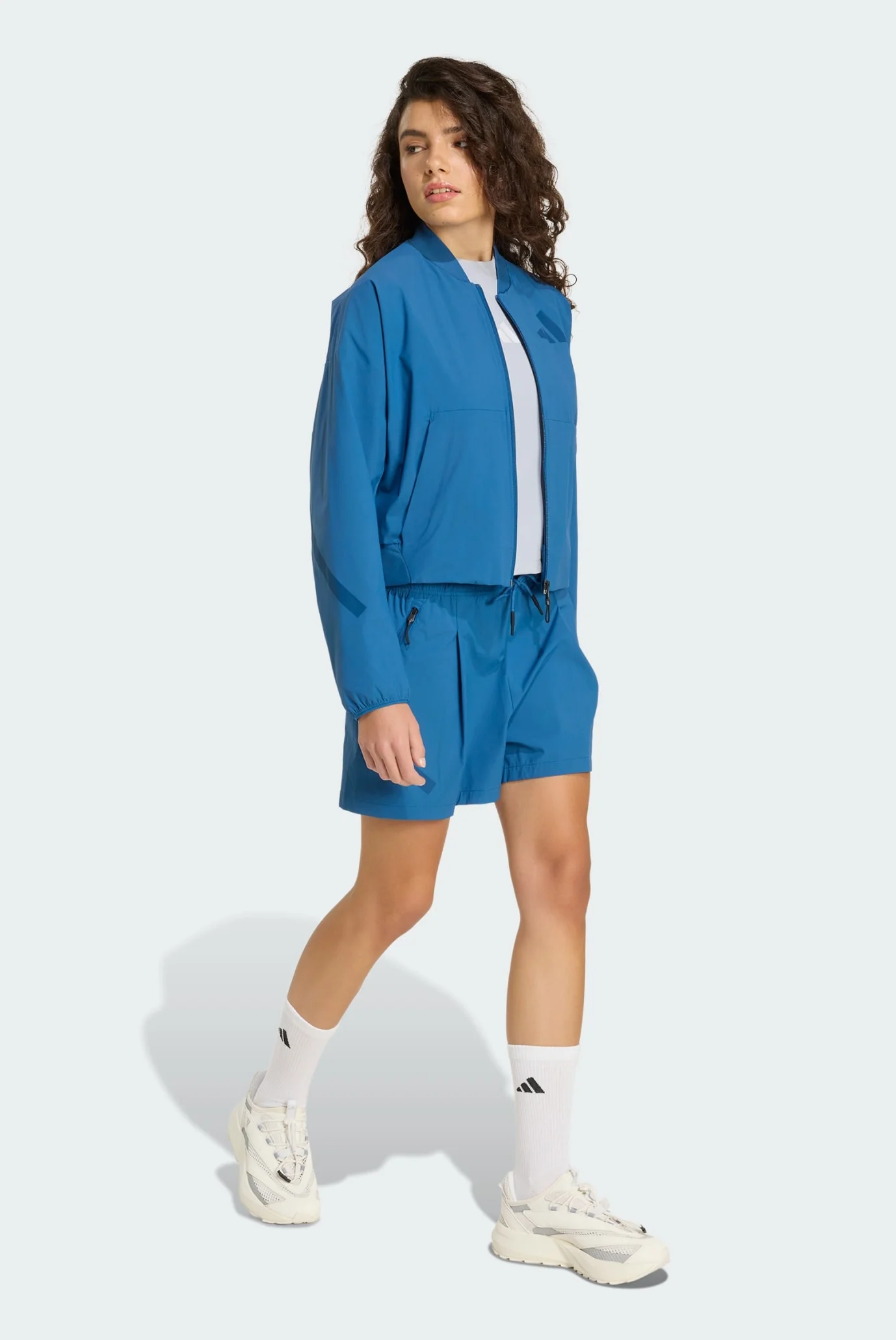Женский синий бомбер ADIDAS Z.N.E. WOVEN adidas KF1822 — MD-Fashion