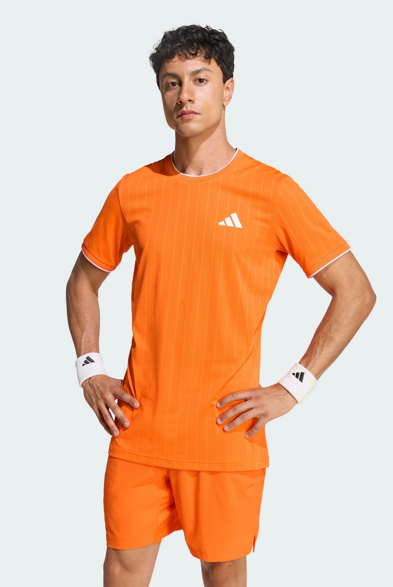Чоловіча помаранчева футболка TENNIS CLIMACOOL+ FREELIFT PRO