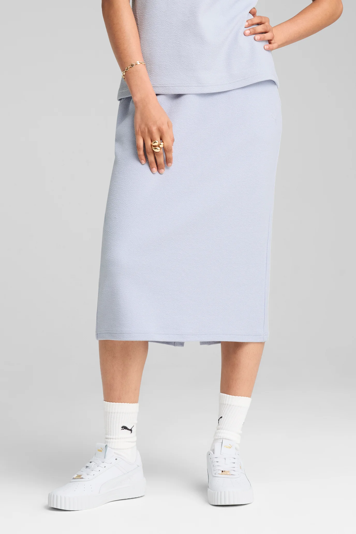 Жіноча блакитна спідниця HER Skirt Women PUMA 685059_47 — MD-Fashion