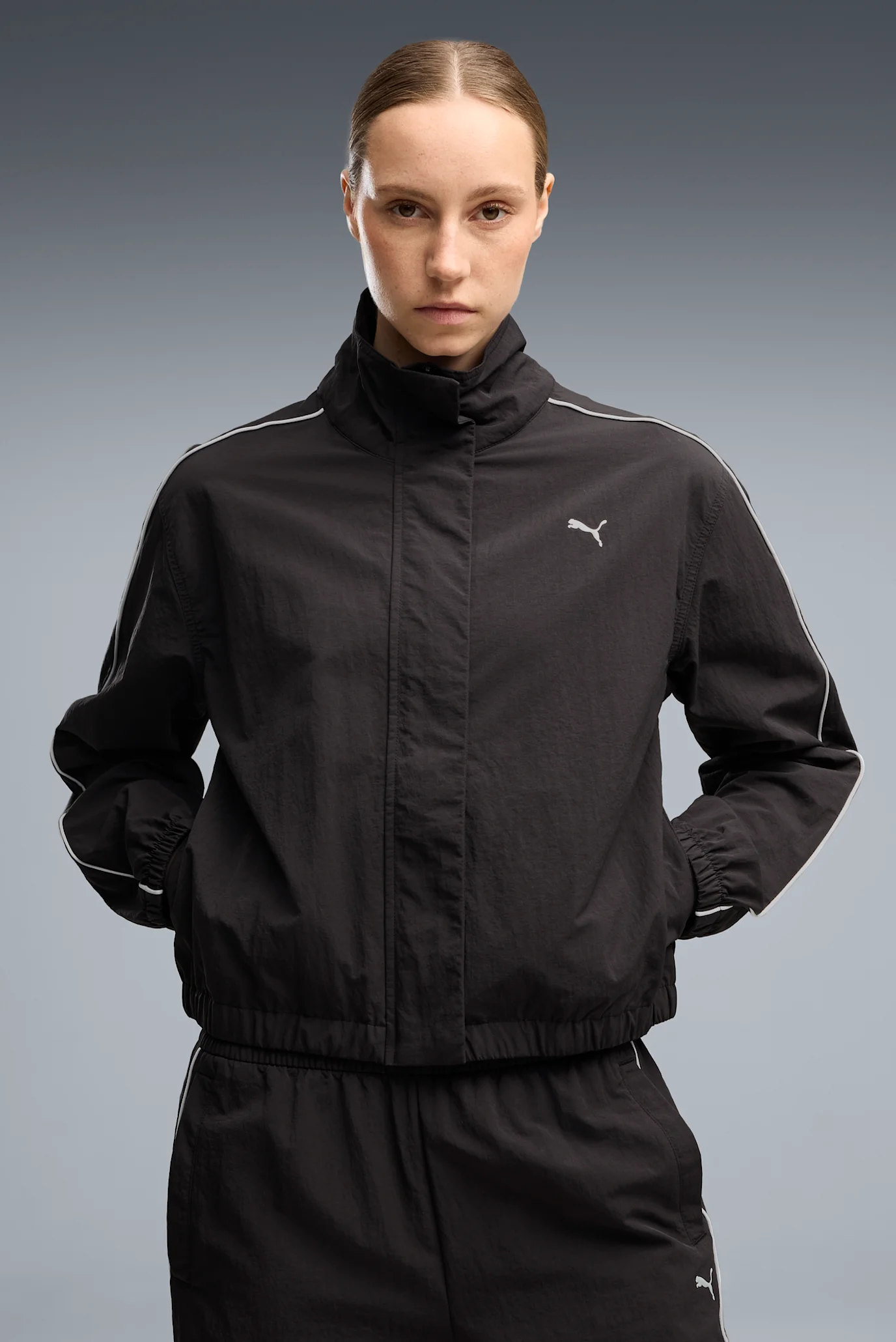 jjtom  Жіноча чорна вітровка Tropical Speed Moto Woven Jacket Women PUMA