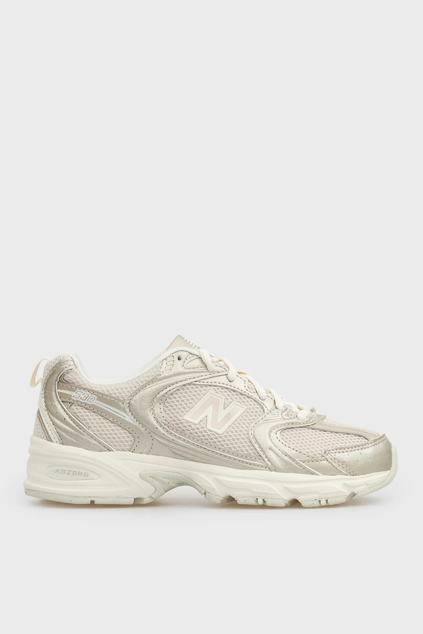 Золотисті шкіряні кросівки 530 New Balance U5301Z0 — MD-Fashion