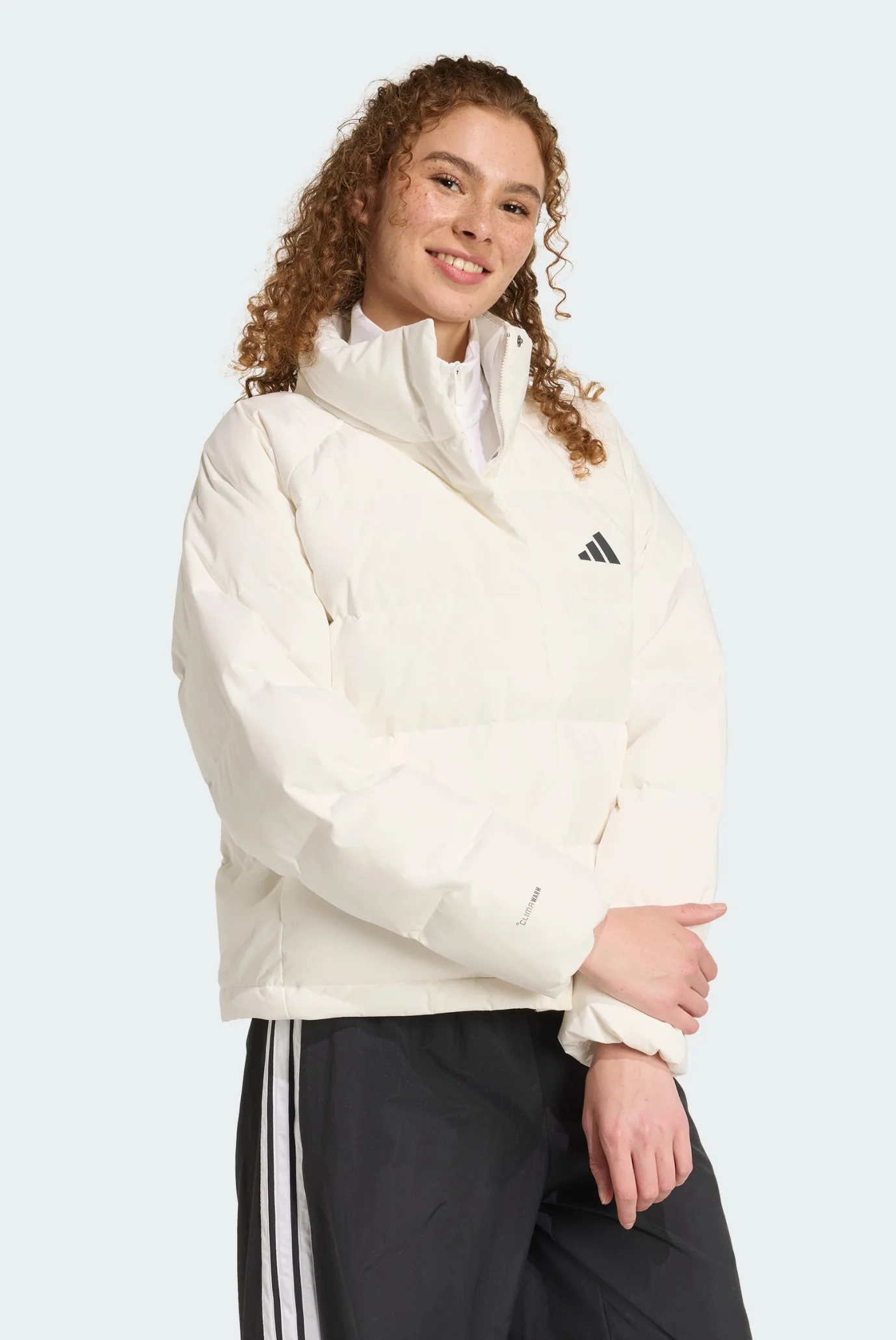 はにわ Женский белый пуховик Helionic CLIMAWARM Relaxed adidas JX3029