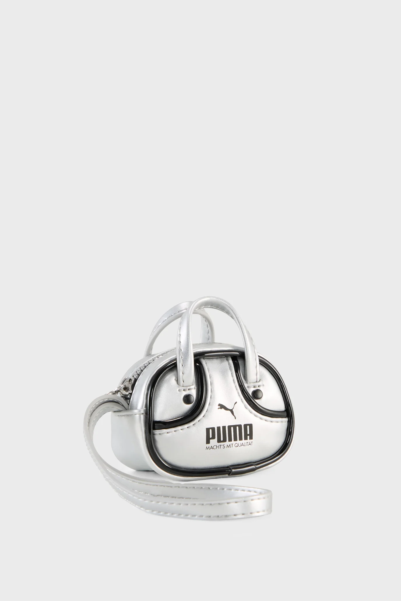 Женская серебристая сумка PUMA 1976 METALLIC 0.2L Grip Bag