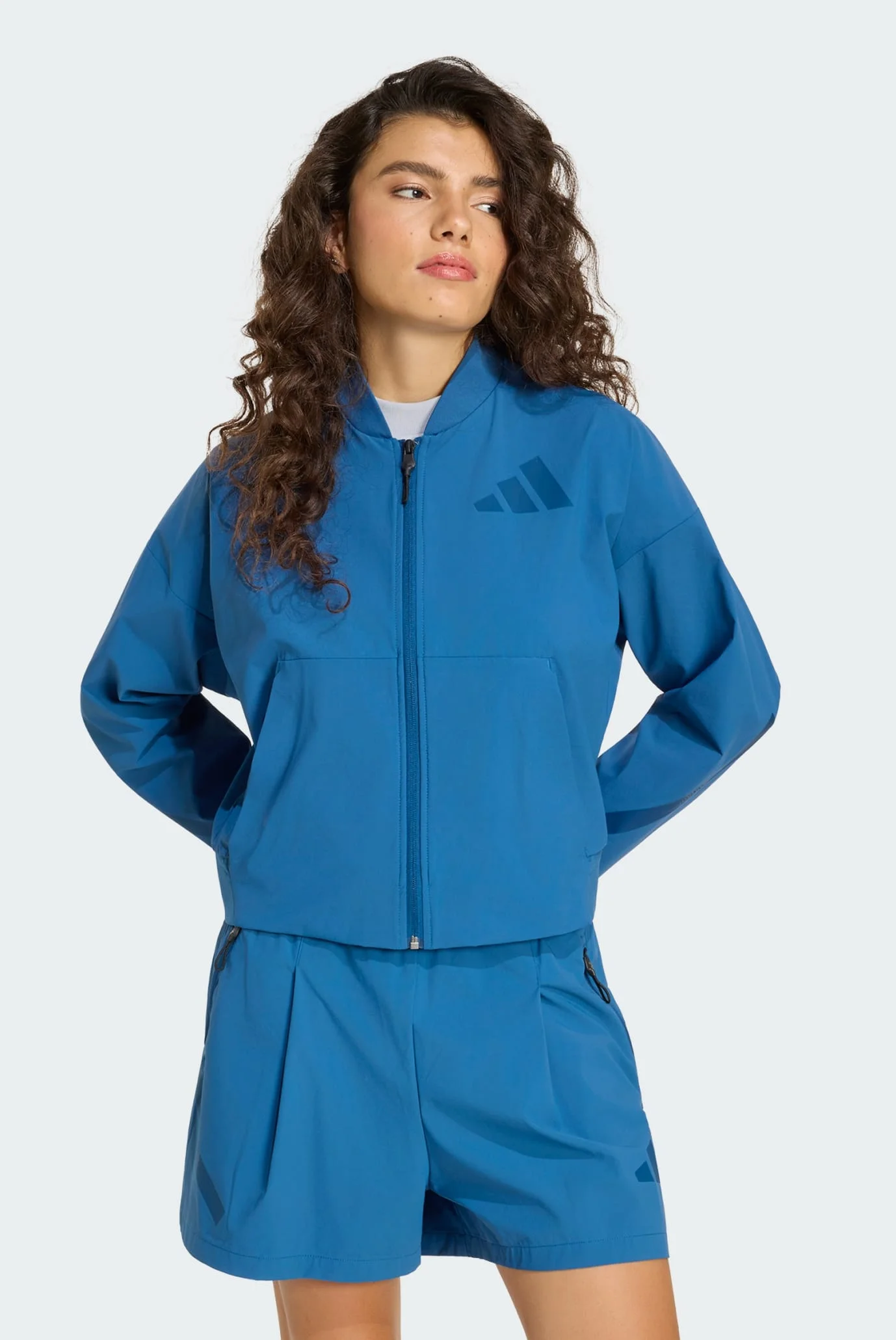 Женский синий бомбер ADIDAS Z.N.E. WOVEN adidas KF1822 — MD-Fashion