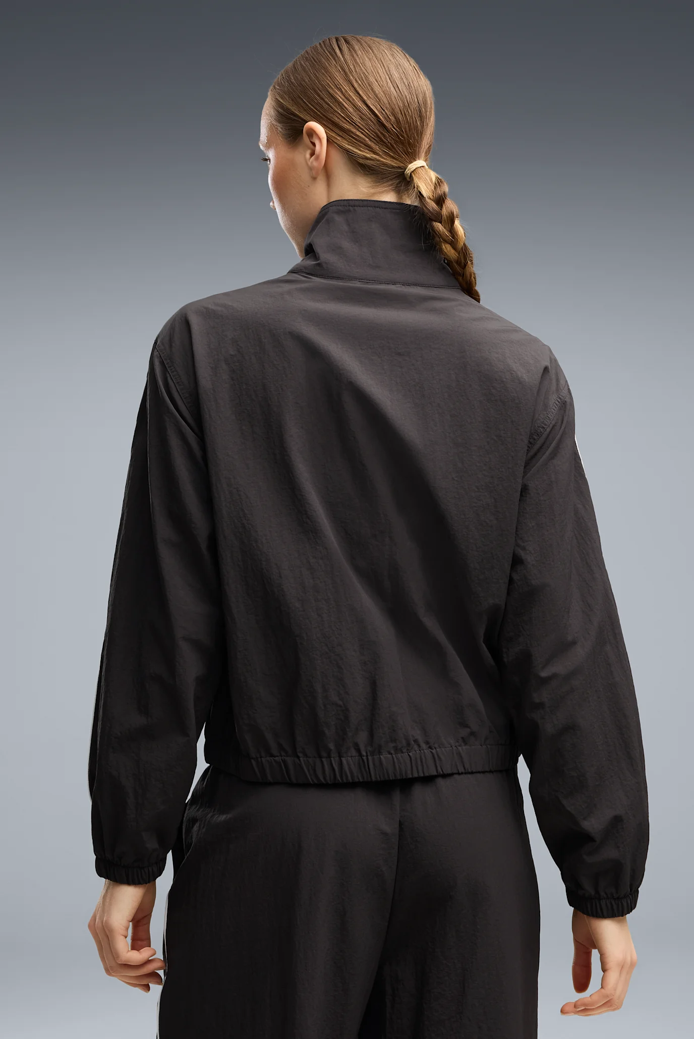 Жіноча чорна вітровка Tropical Speed Moto Woven Jacket Women PUMA