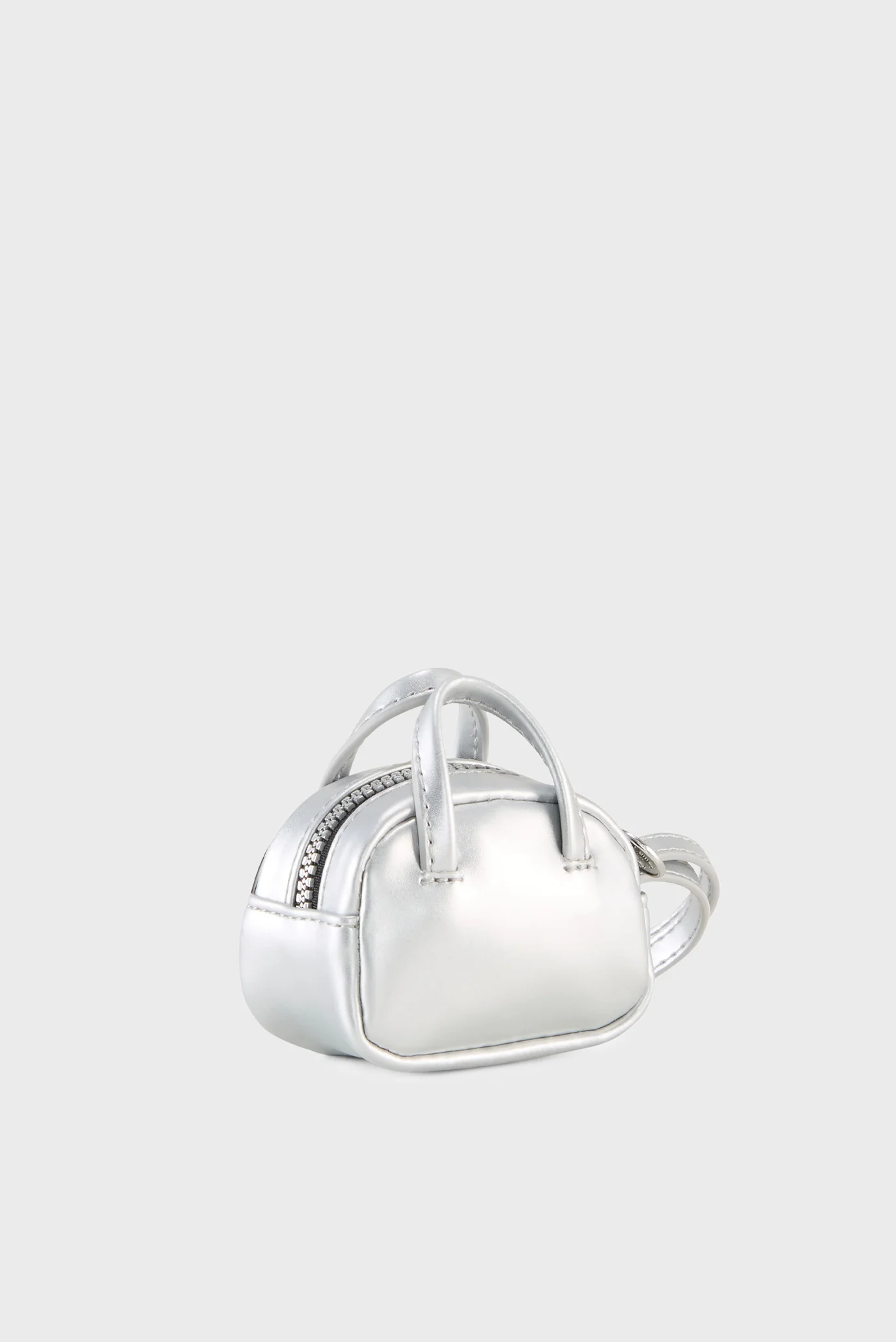 Женская серебристая сумка PUMA 1976 METALLIC 0.2L Grip Bag