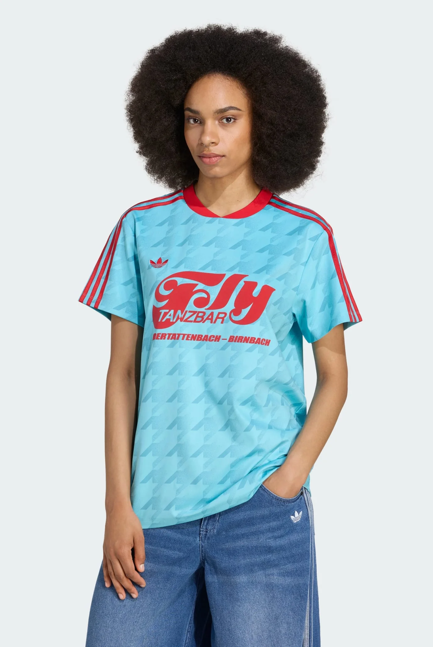 Жіноча блакитна футболка з візерунком Graphic Football Allover