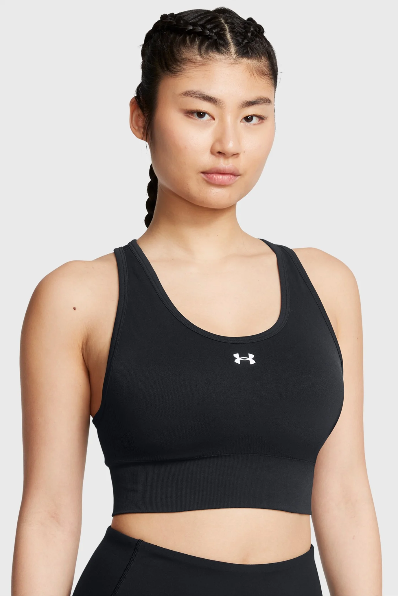 Женский черный топ Vanish Seamless Mid Bra Under Armour 1384419