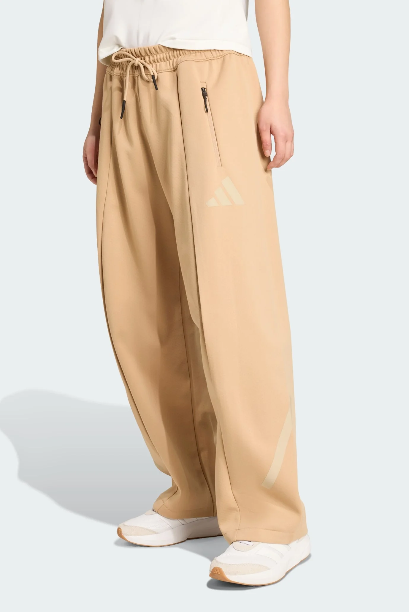 Женские бежевые спортивные брюки adidas Z.N.E. Open-Hem adidas